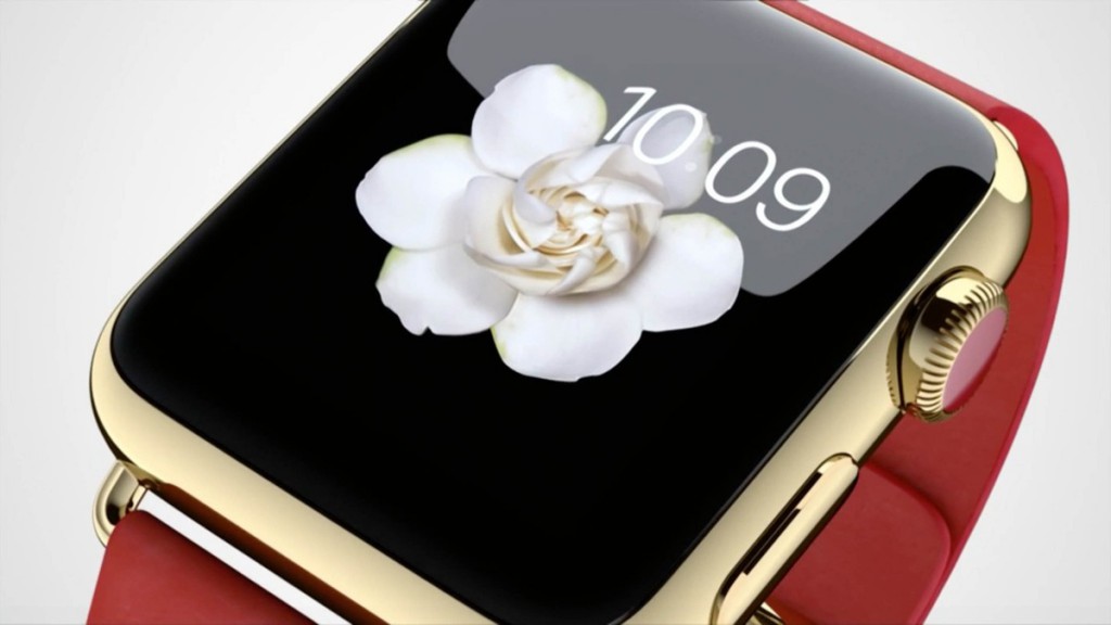 Gold apple watch with red band