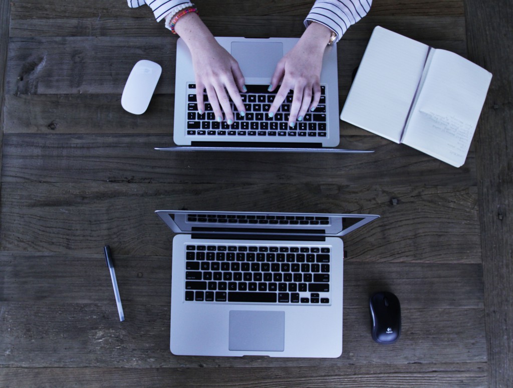 overhead shot of person working in the laptop