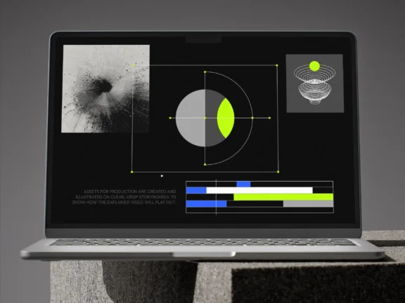 2D explainer video storyboard on a laptop